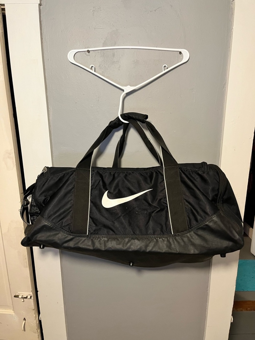 Nike Black Duffel Bag with White Swoosh